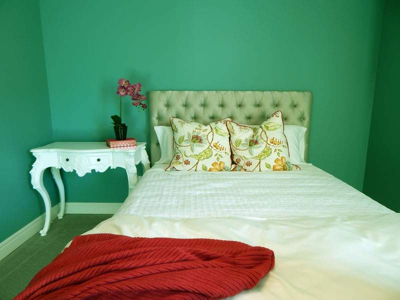 Bed with high headboard